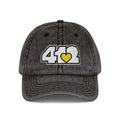 Pittsburgh Vintage Hat | Embroidered White and Yellow 412 Logo. Apparel Color: Black. A relaxed fit, cotton twill fabric, adjustable buckle, and washed-out finish look.