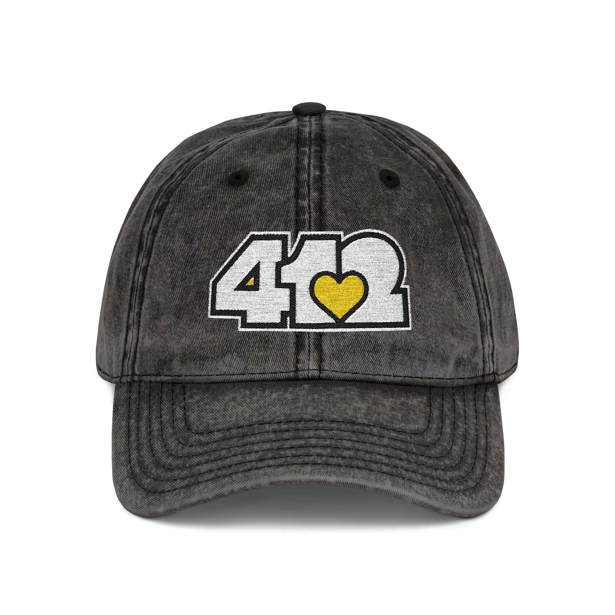 Pittsburgh Vintage Hat | Embroidered White and Yellow 412 Logo. Apparel Color: Black. A relaxed fit, cotton twill fabric, adjustable buckle, and washed-out finish look.
