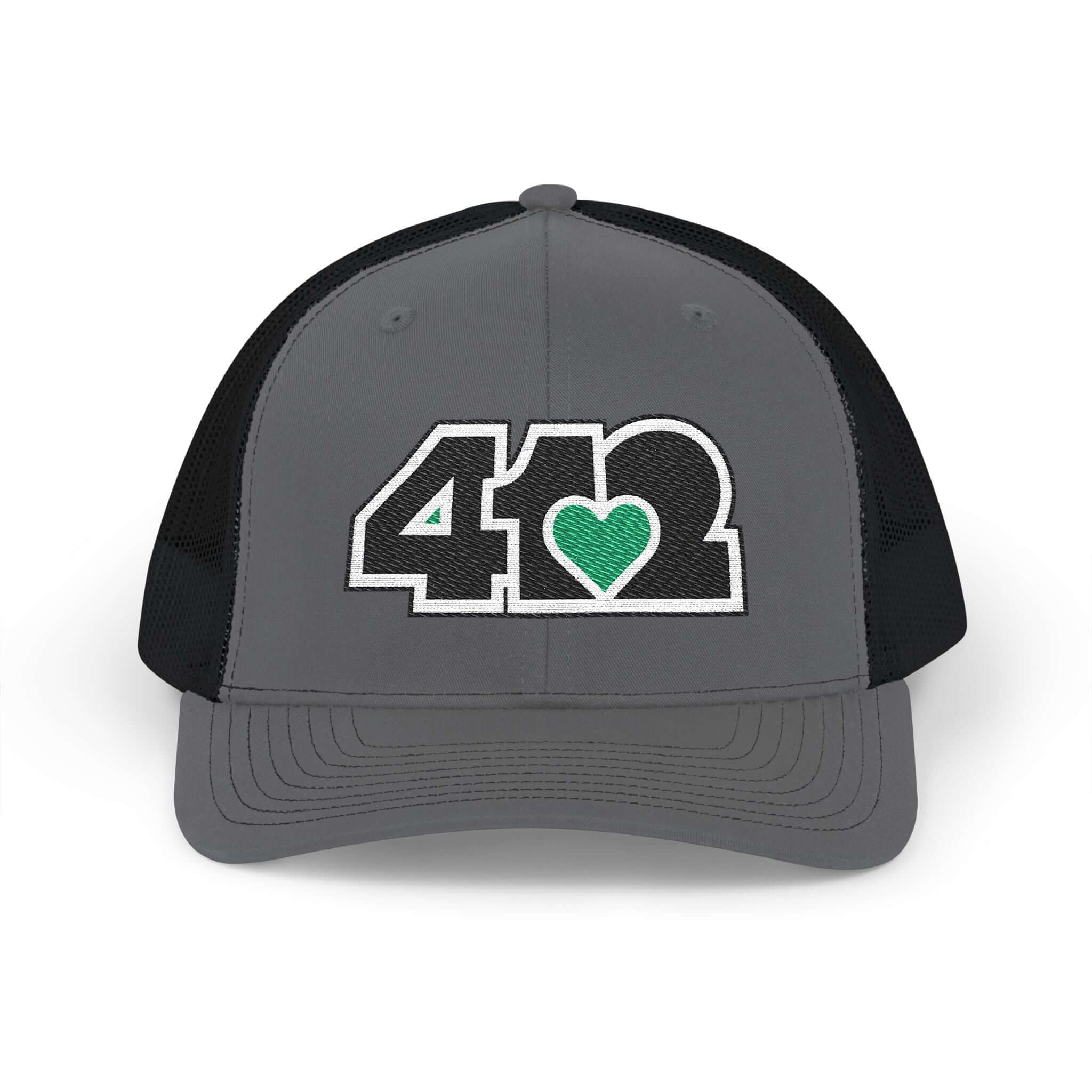 Snapback Hat | Embroidered Black and Green 412 Logo. Apparel Color: Charcoal/Black. A comfy mid-profile adjustable fit for everyday flair