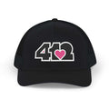 Snapback Hat | Embroidered Black and Pink 412 Logo. Apparel Color: Black. A comfy mid-profile adjustable fit for everyday flair