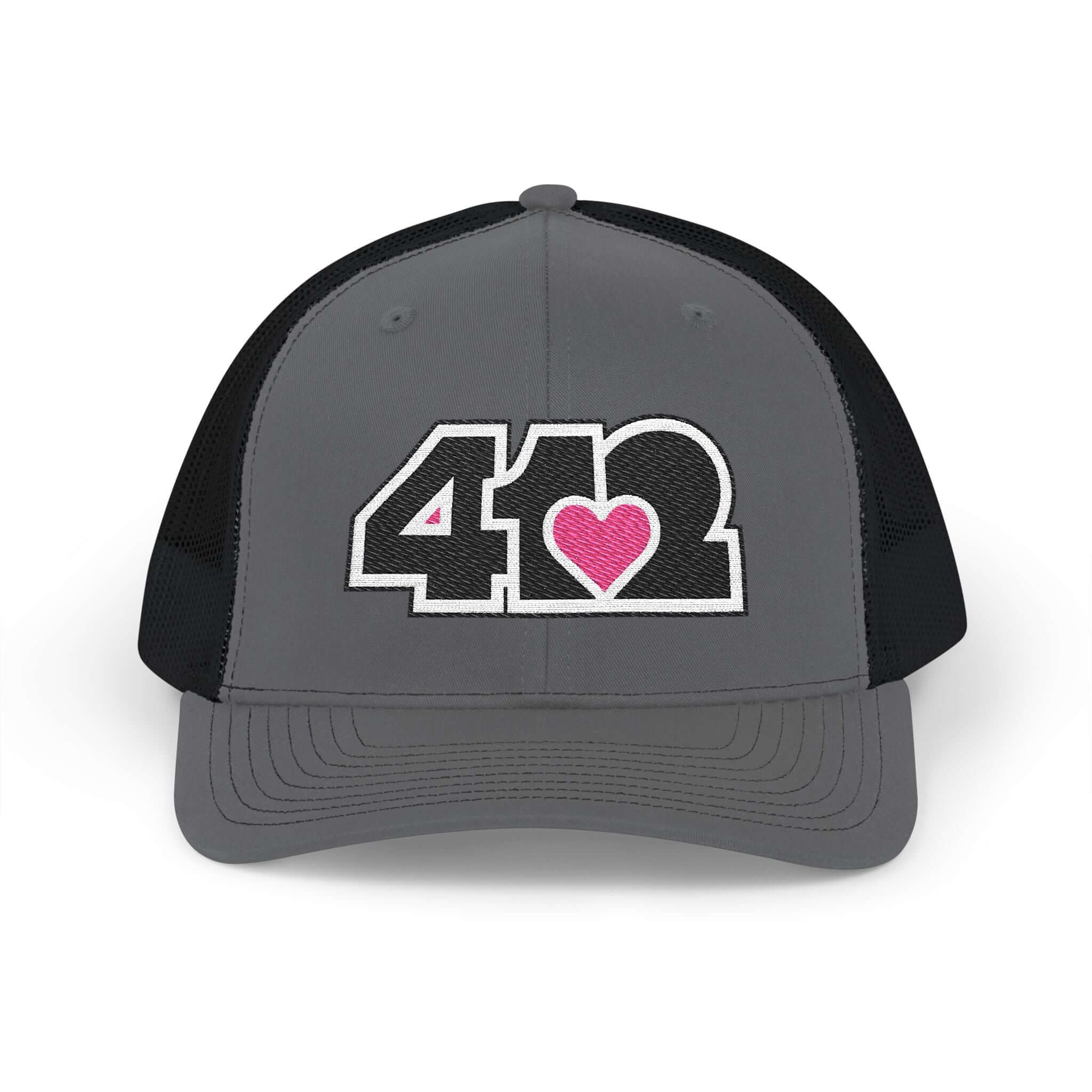 Snapback Hat | Embroidered Black and Pink 412 Logo. Apparel Color: Charcoal/Black. A comfy mid-profile adjustable fit for everyday flair