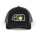 Snapback Hat | Embroidered Black and Yellow 412 Logo. Apparel Color: Black/Charcoal. A comfy mid-profile adjustable fit for everyday flair