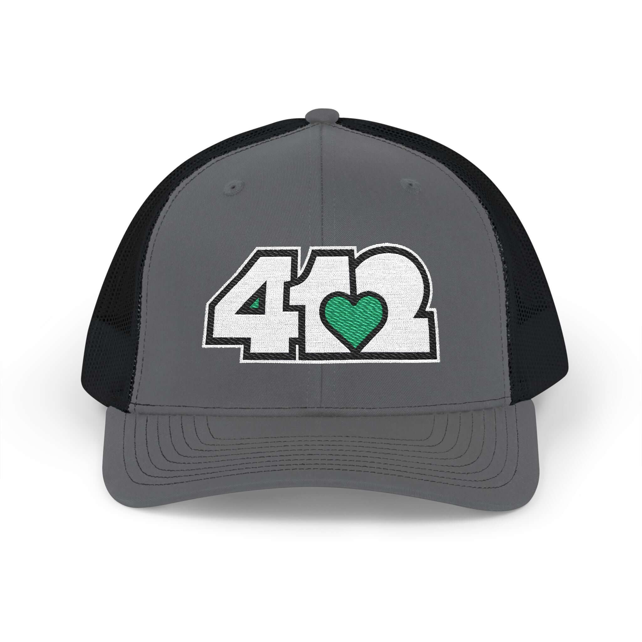 Snapback Hat | Embroidered White and Green 412 Logo. Apparel Color: Charcoal/Black. A comfy mid-profile adjustable fit for everyday flair