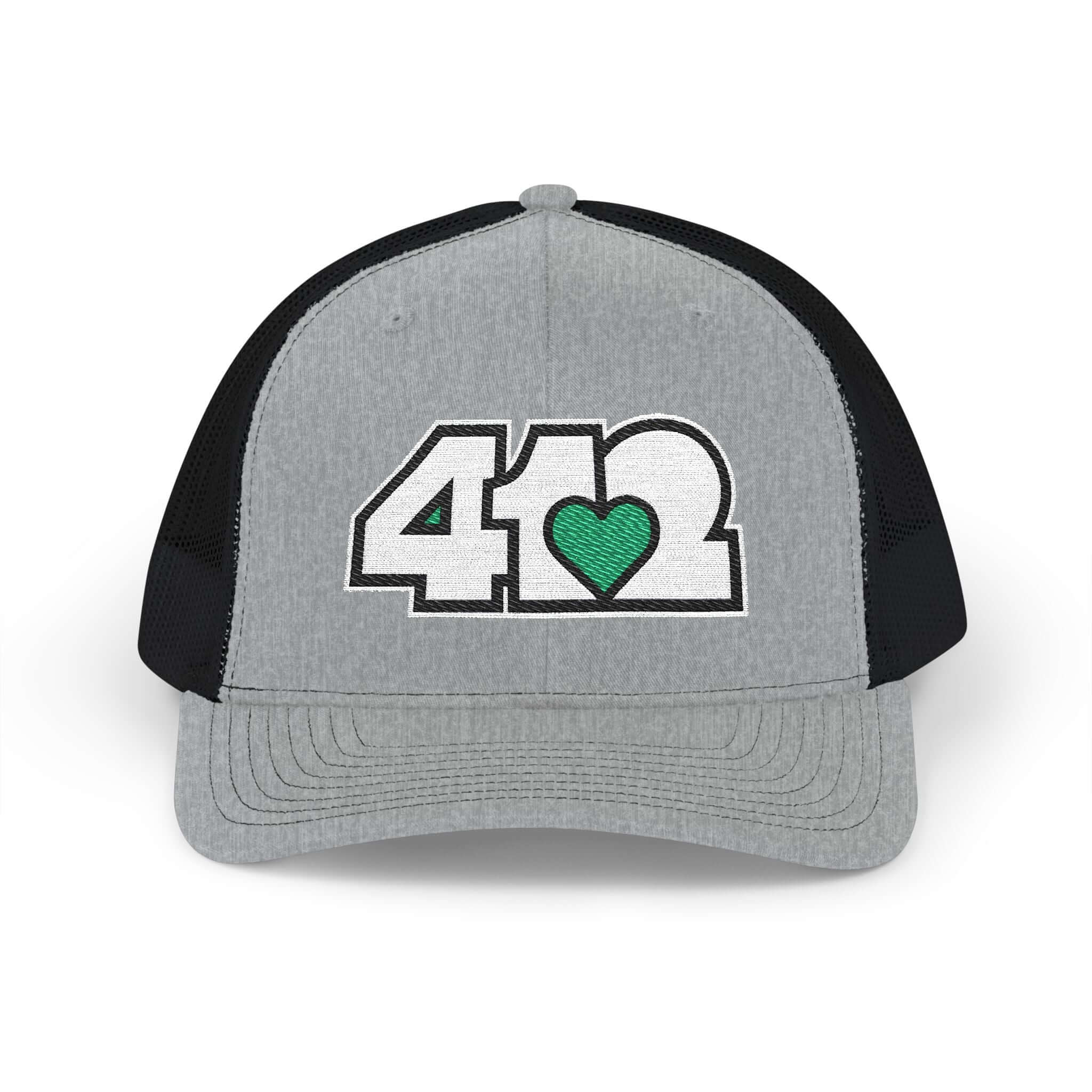 Snapback Hat | Embroidered White and Green 412 Logo. Apparel Color: Heather Grey/Black. A comfy mid-profile adjustable fit for everyday flair