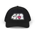 Snapback Hat | Embroidered White and Pink 412 Logo. Apparel Color: Black. A comfy mid-profile adjustable fit for everyday flair