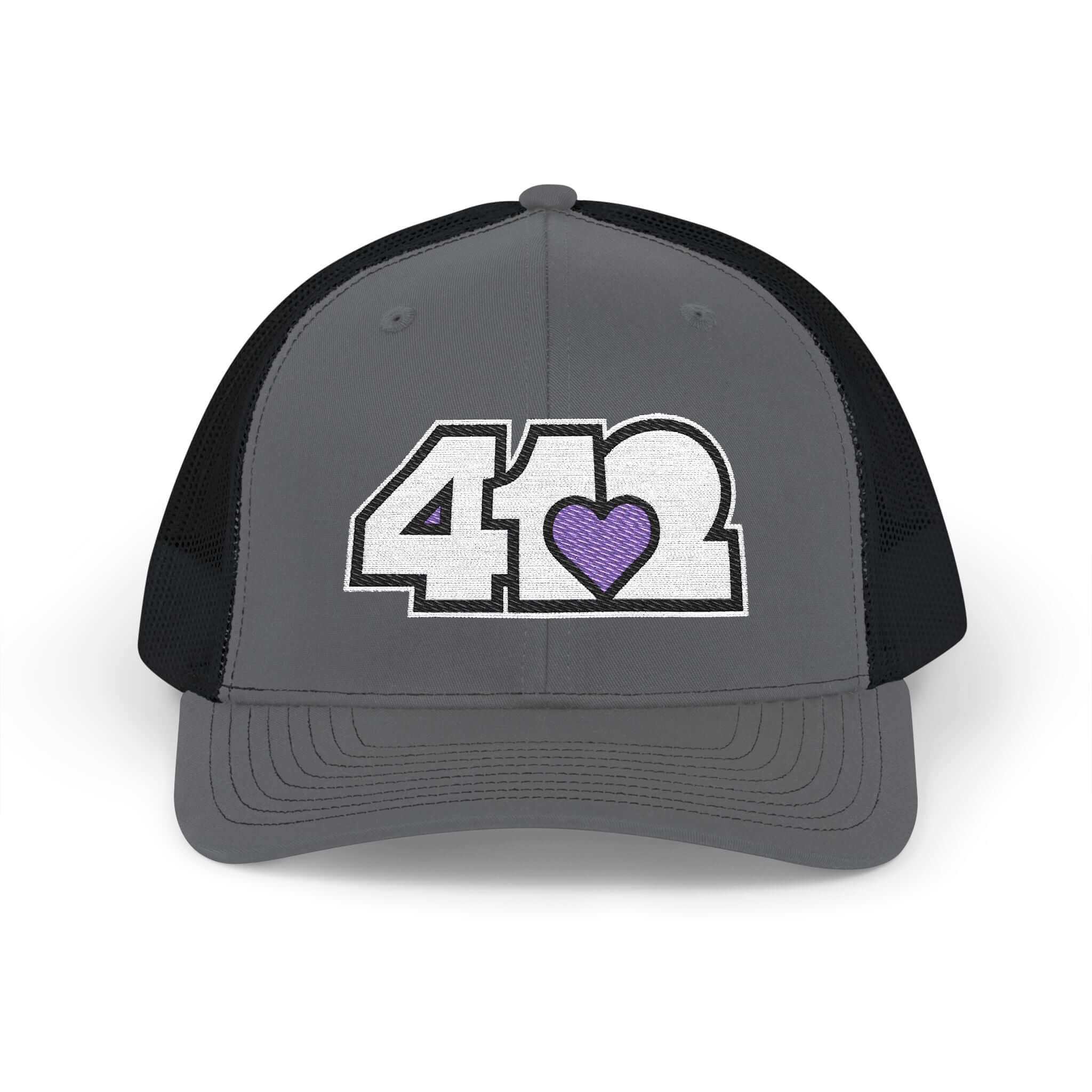 Snapback Hat | Embroidered White and Purple 412 Logo. Apparel Color: Charcoal/Black. A comfy mid-profile adjustable fit for everyday flair