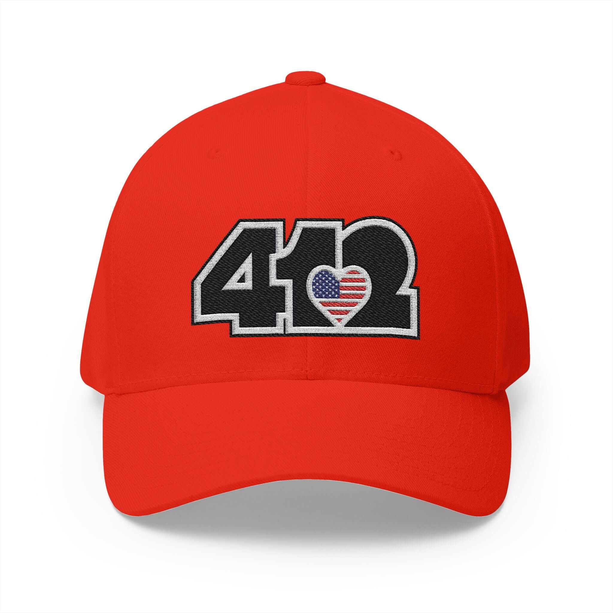 Stretch Fit Hat | Embroidered Black Stars and Stripes 412 Logo. Apparel Color: Red. The sleek design, featuring a mid-profile silhouette, and a curved visor.