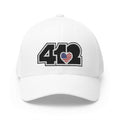Stretch Fit Hat | Embroidered Black Stars and Stripes 412 Logo. Apparel Color: White. The sleek design, featuring a mid-profile silhouette, and a curved visor.