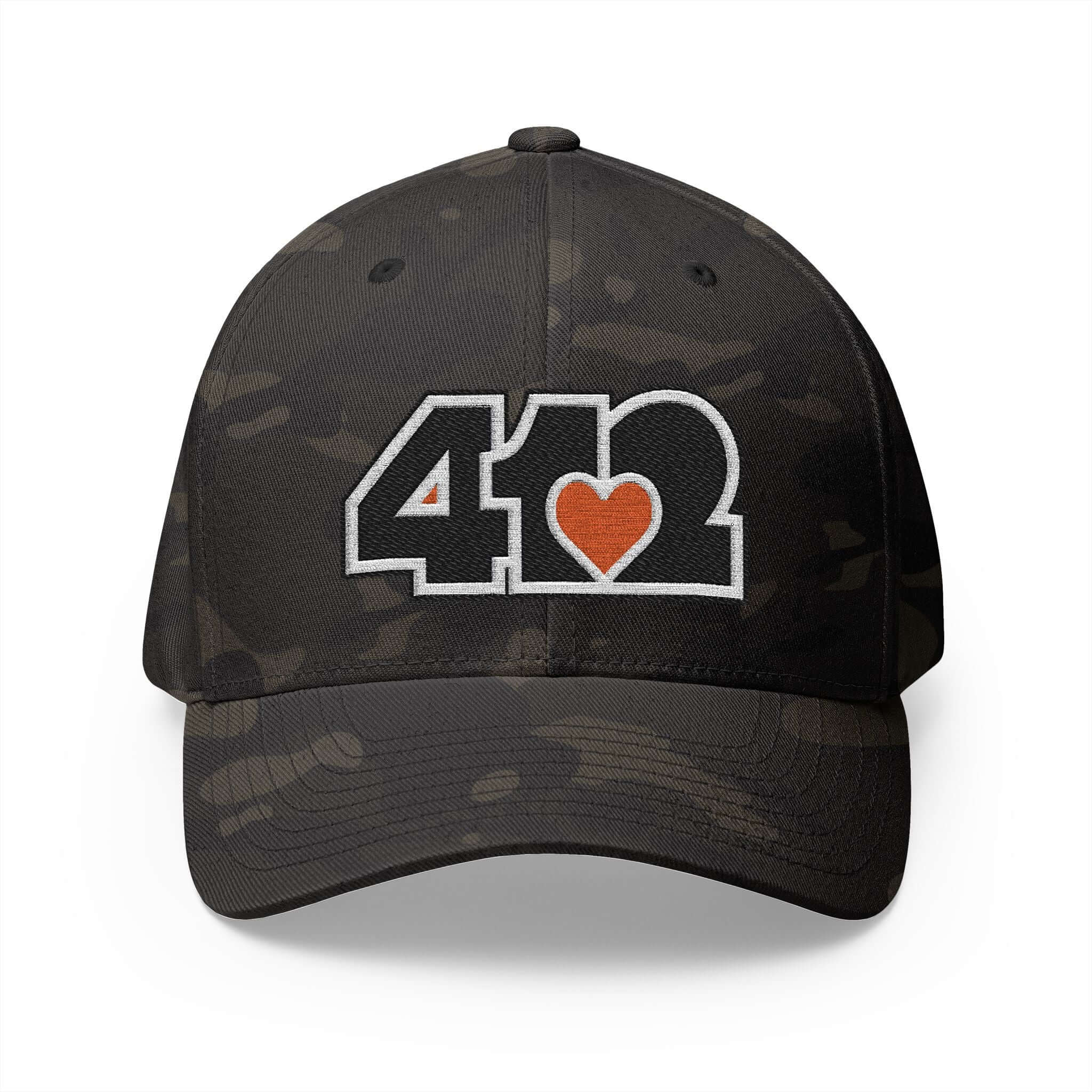 Stretch Fit Hat | Embroidered Black and Orange 412 Logo. Apparel Color: Multicam Black. The sleek design, featuring a mid-profile silhouette, and a curved visor.