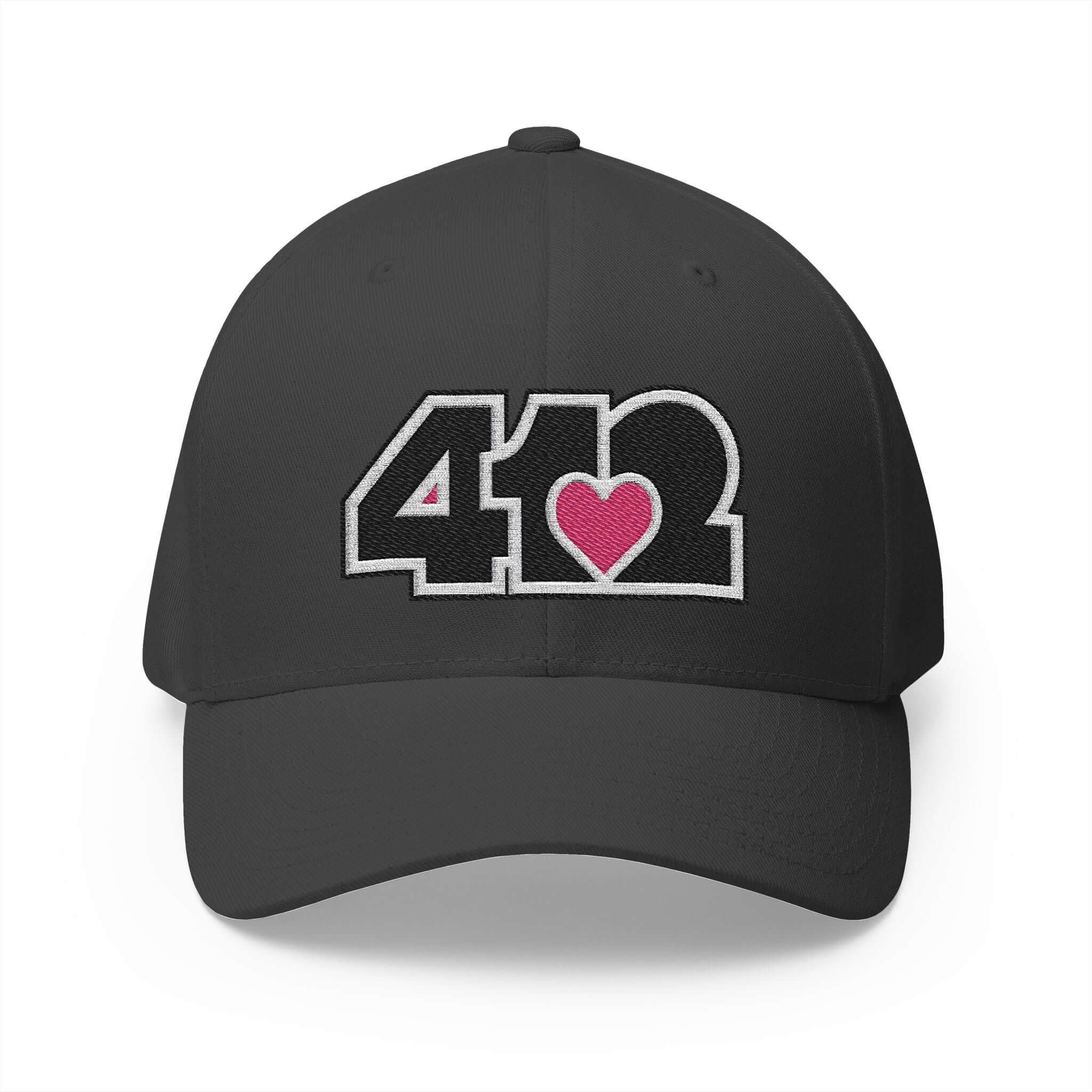 Stretch Fit Hat | Embroidered Black and Pink 412 Logo. Apparel Color: Dark Grey. The sleek design, featuring a mid-profile silhouette, and a curved visor.
