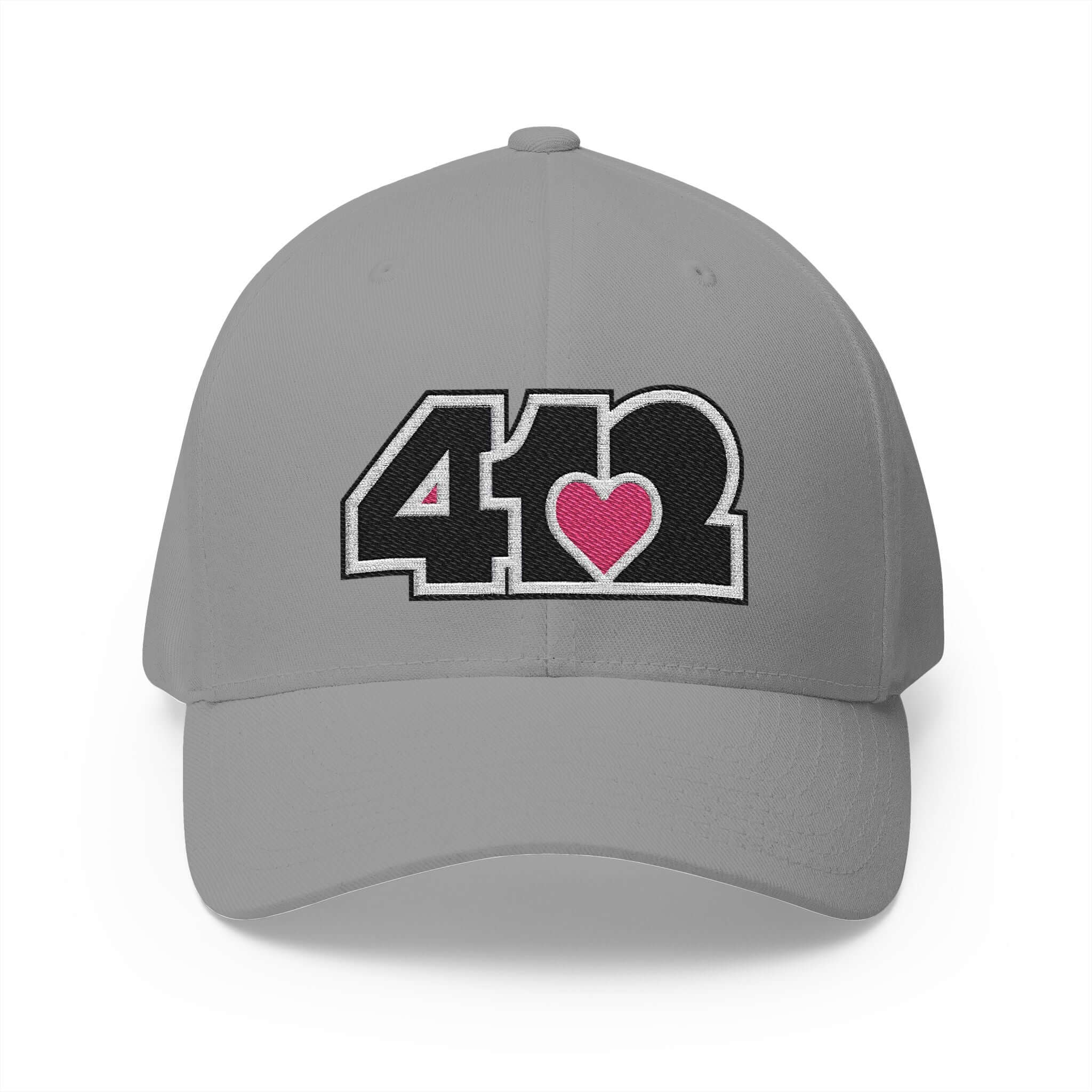 Stretch Fit Hat | Embroidered Black and Pink 412 Logo. Apparel Color: Grey. The sleek design, featuring a mid-profile silhouette, and a curved visor.