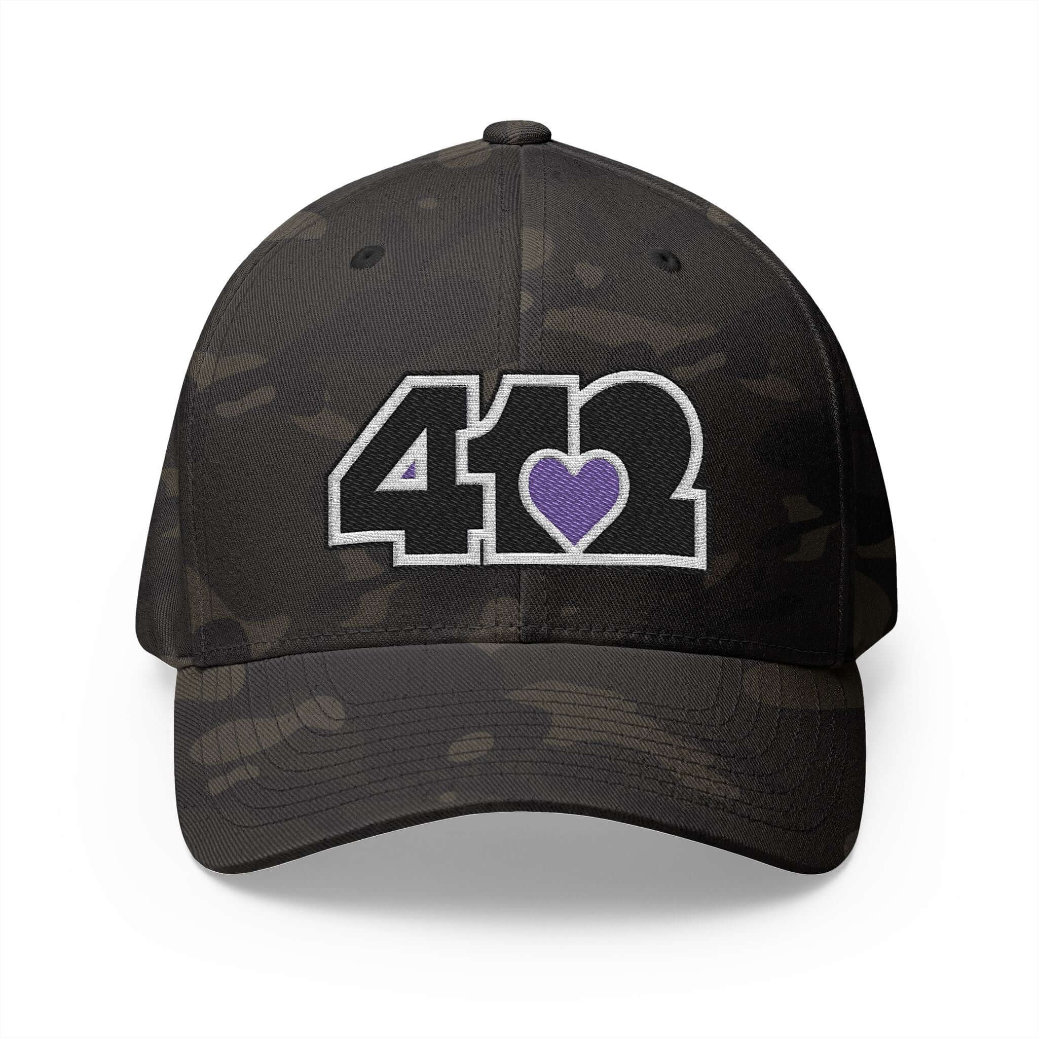 Stretch Fit Hat | Embroidered Black and Purple 412 Logo. Apparel Color: Multicam Black. The sleek design, featuring a mid-profile silhouette, and a curved visor.