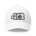 Stretch Fit Hat | Embroidered White Stars and Stripes 412 Logo. Apparel Color: White. The sleek design, featuring a mid-profile silhouette, and a curved visor.