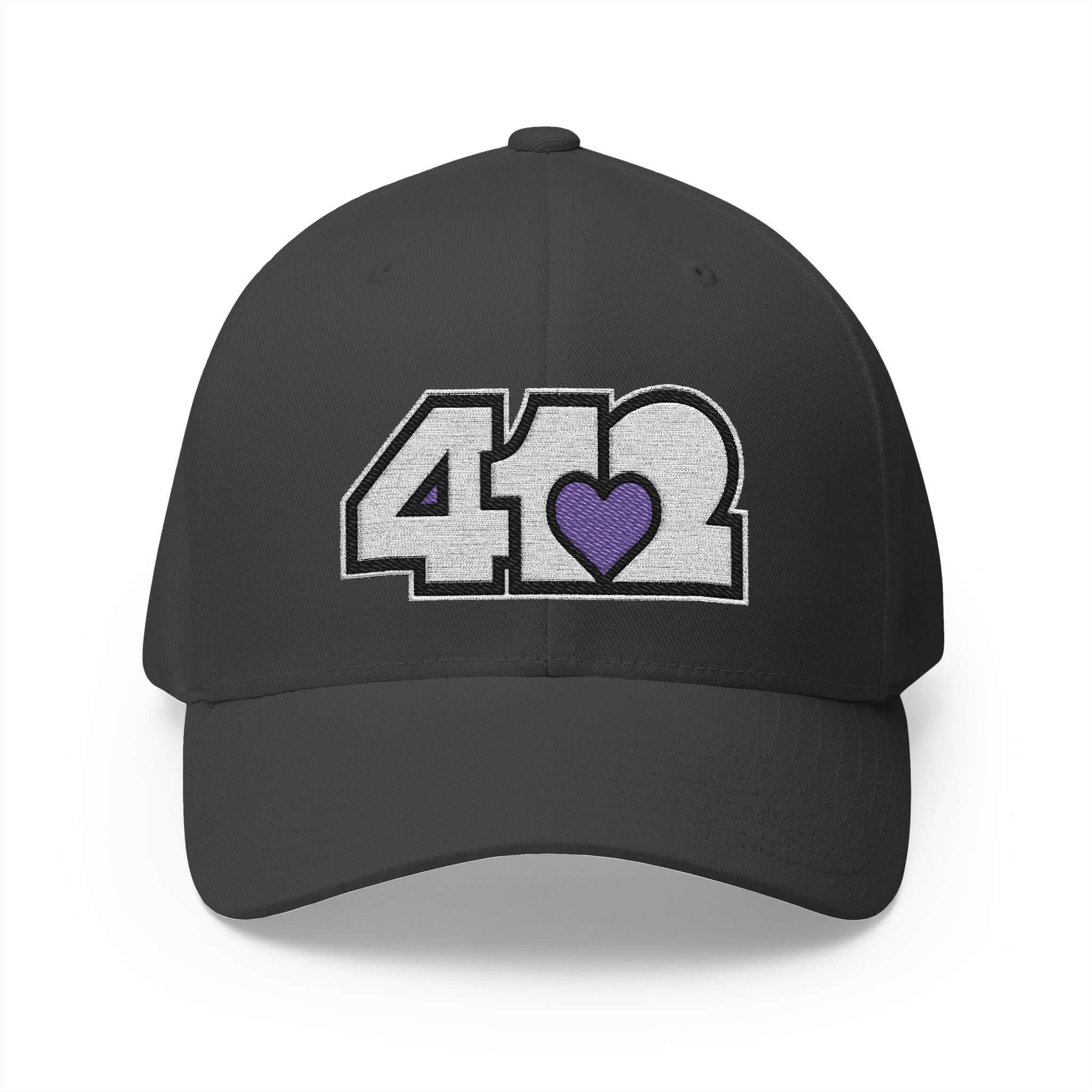 Stretch Fit Hat | Embroidered White and Purple 412 Logo. Apparel Color: Dark Grey. The sleek design, featuring a mid-profile silhouette, and a curved visor.