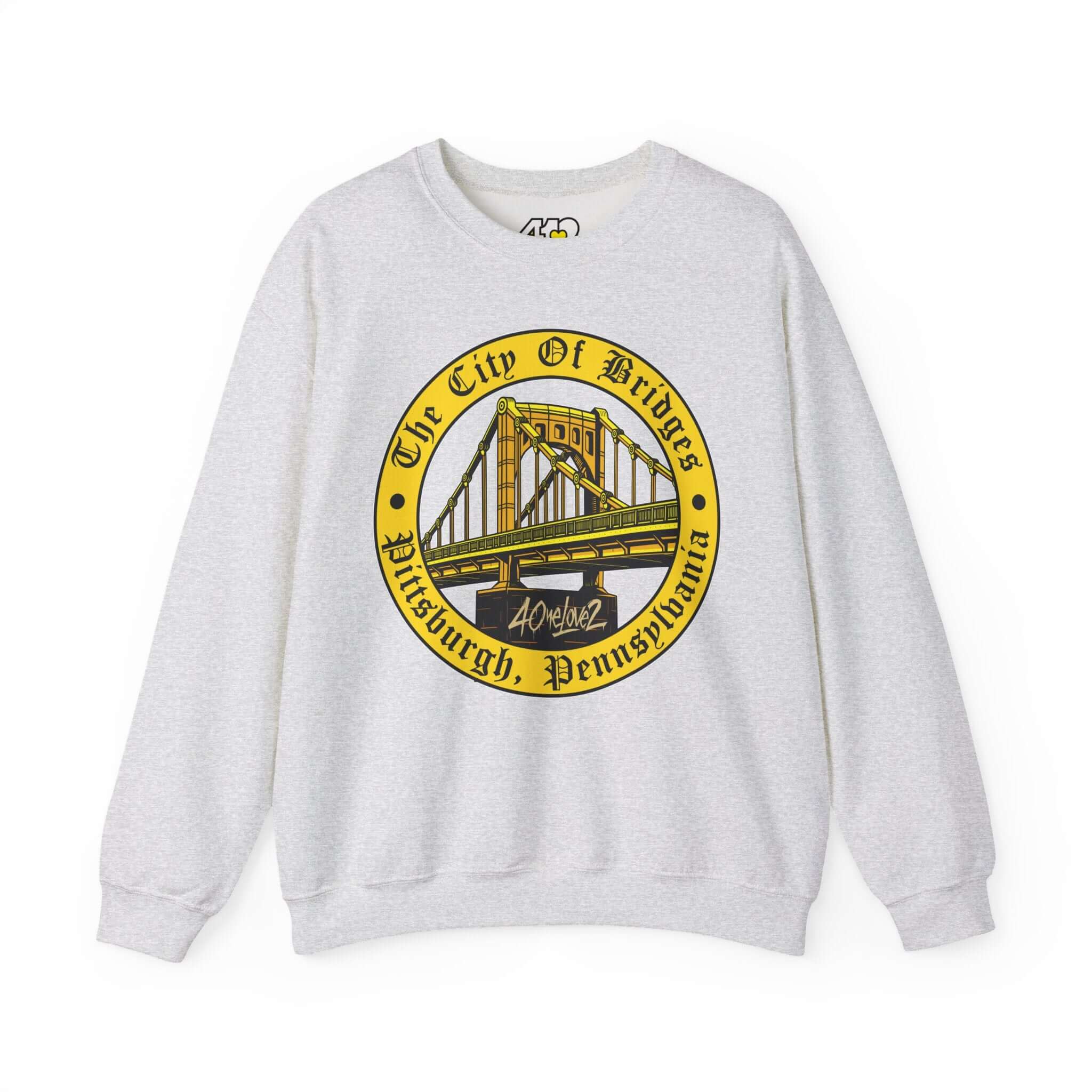 The City of Bridges Sweatshirt. Apparel Color: Ash. A blend of 50% cotton and 50% polyester for cozy durability. With an Elastic ribbed collar, and Double-needle stitching.