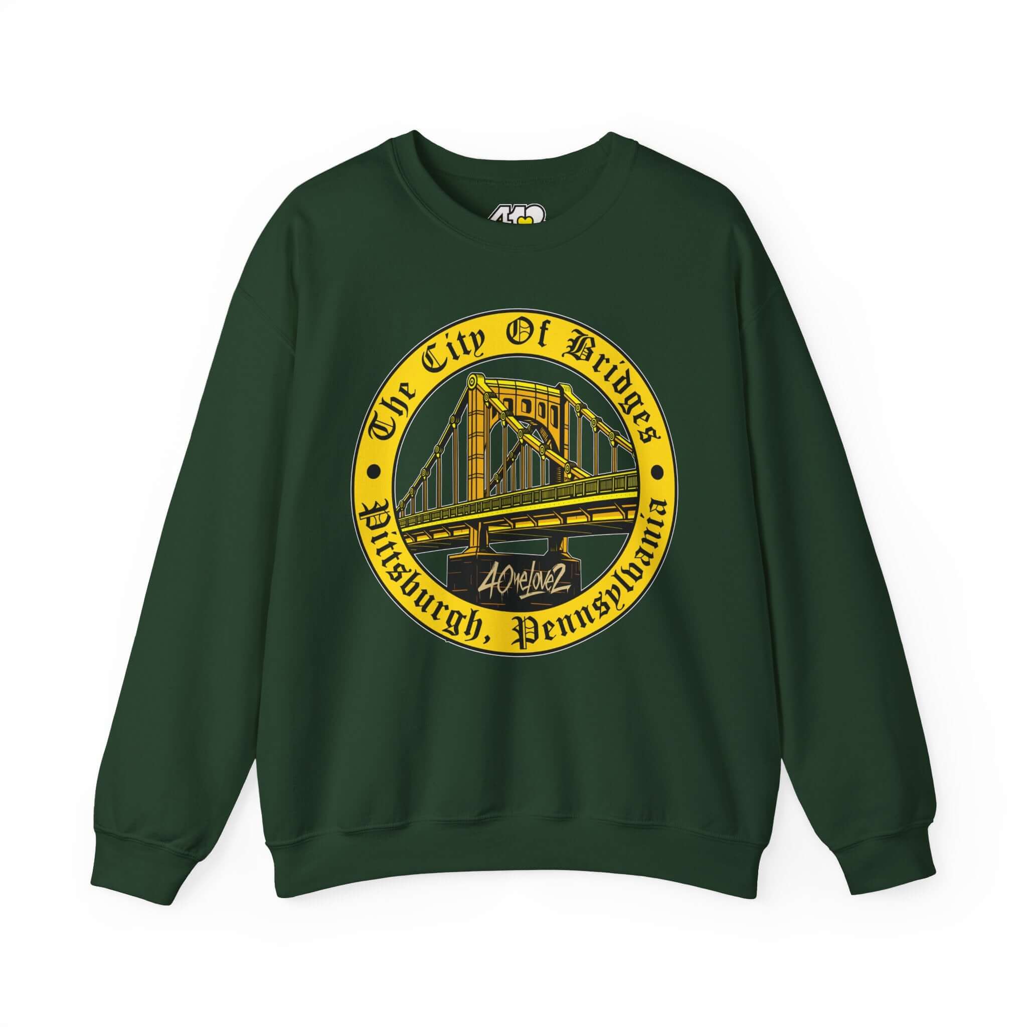 The City of Bridges Sweatshirt. Apparel Color: Forest Green. A blend of 50% cotton and 50% polyester for cozy durability. With an Elastic ribbed collar, and Double-needle stitching.