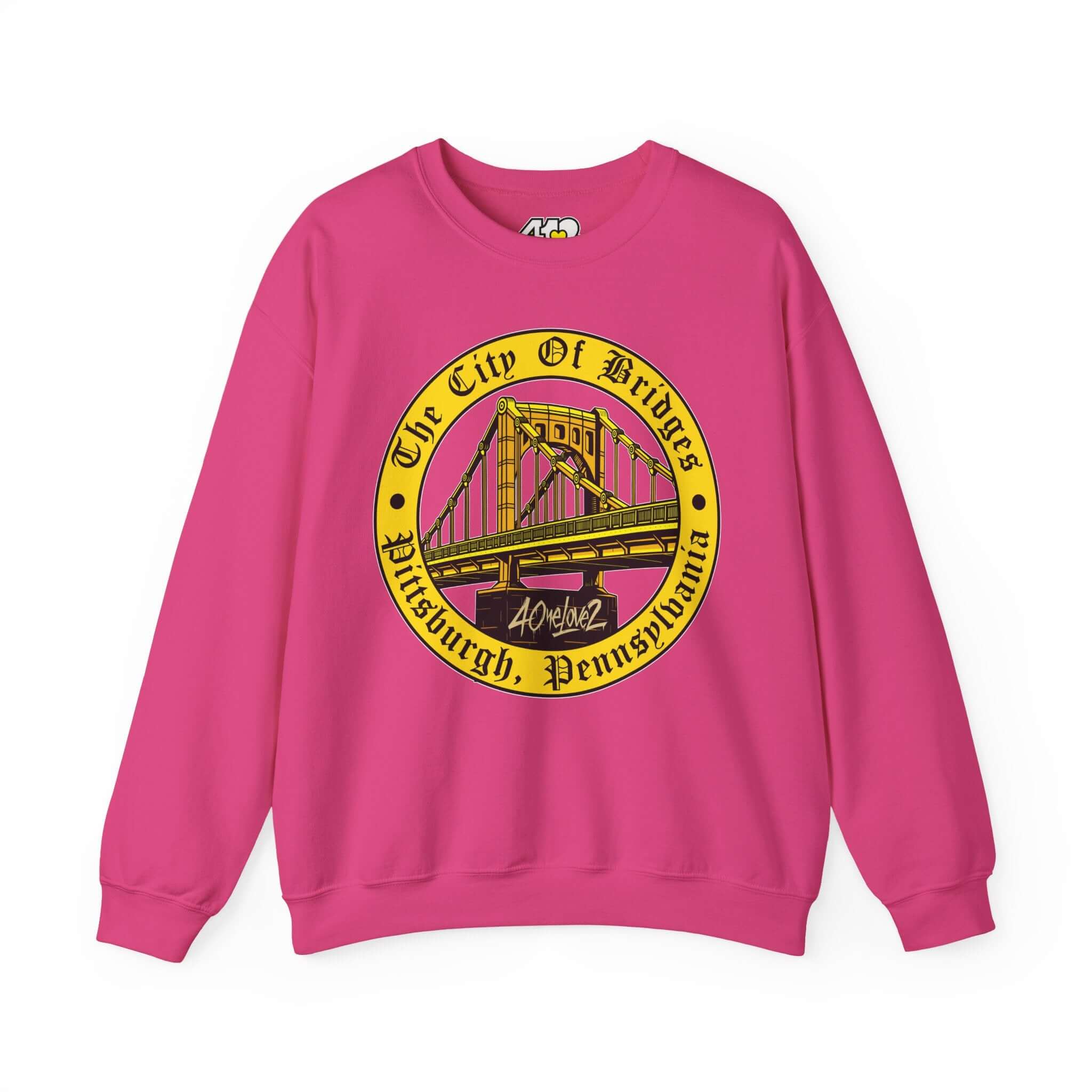 The City of Bridges Sweatshirt. Apparel Color: Heliconia. A blend of 50% cotton and 50% polyester for cozy durability. With an Elastic ribbed collar, and Double-needle stitching.