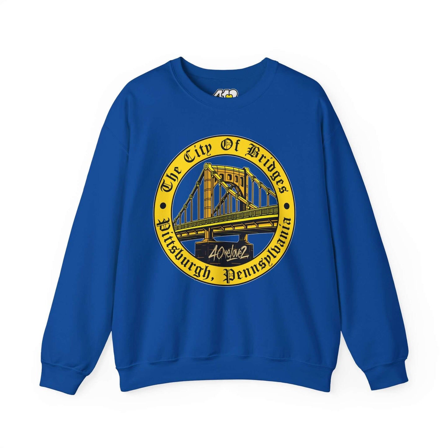 The City of Bridges Sweatshirt. Apparel Color: Royal. A blend of 50% cotton and 50% polyester for cozy durability. With an Elastic ribbed collar, and Double-needle stitching.